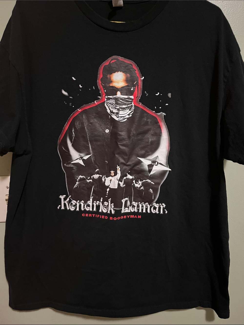 Next Level Apparel Black Tee with Red-Accented Graphic